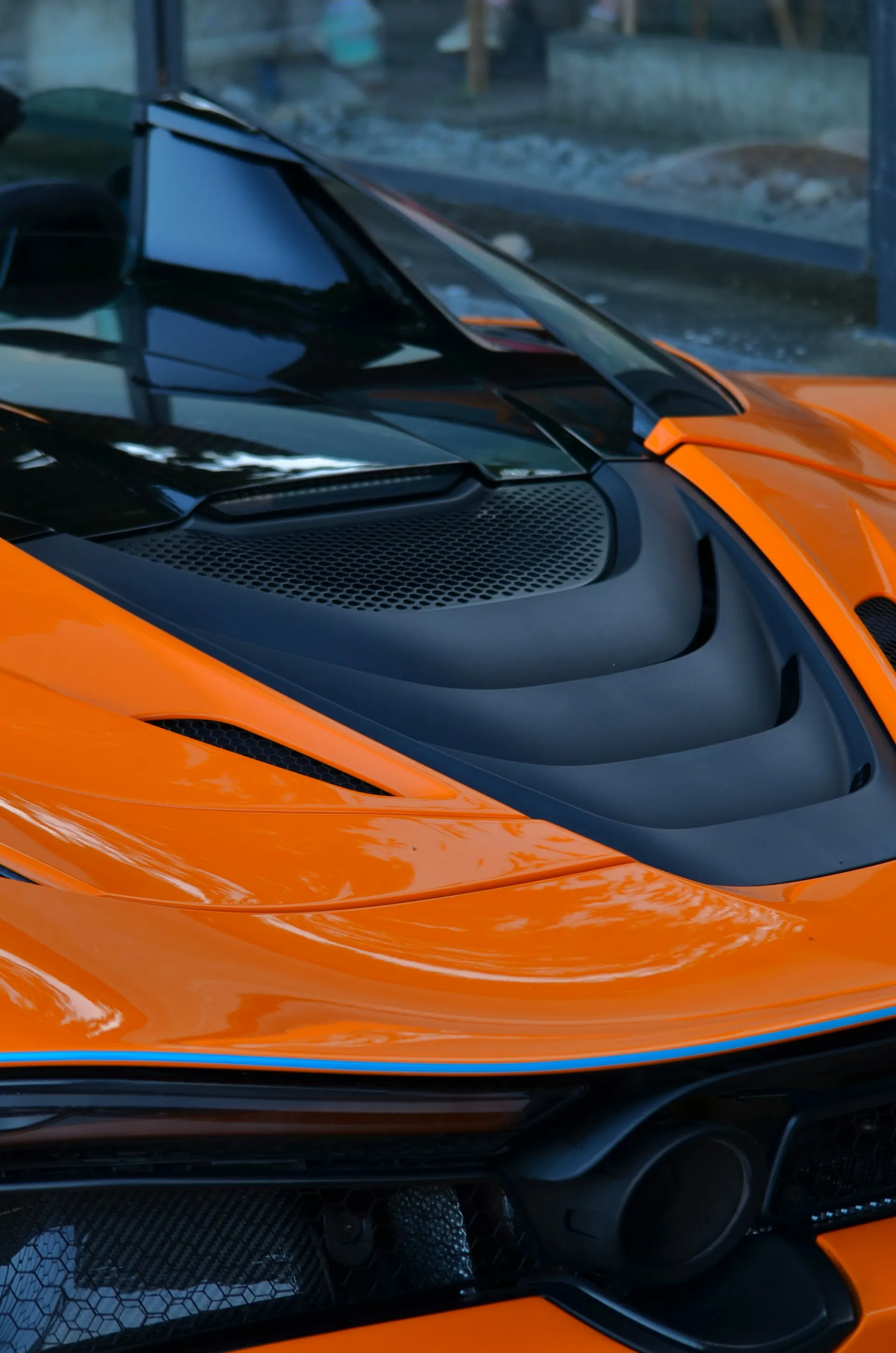 Orange sports car rear profile